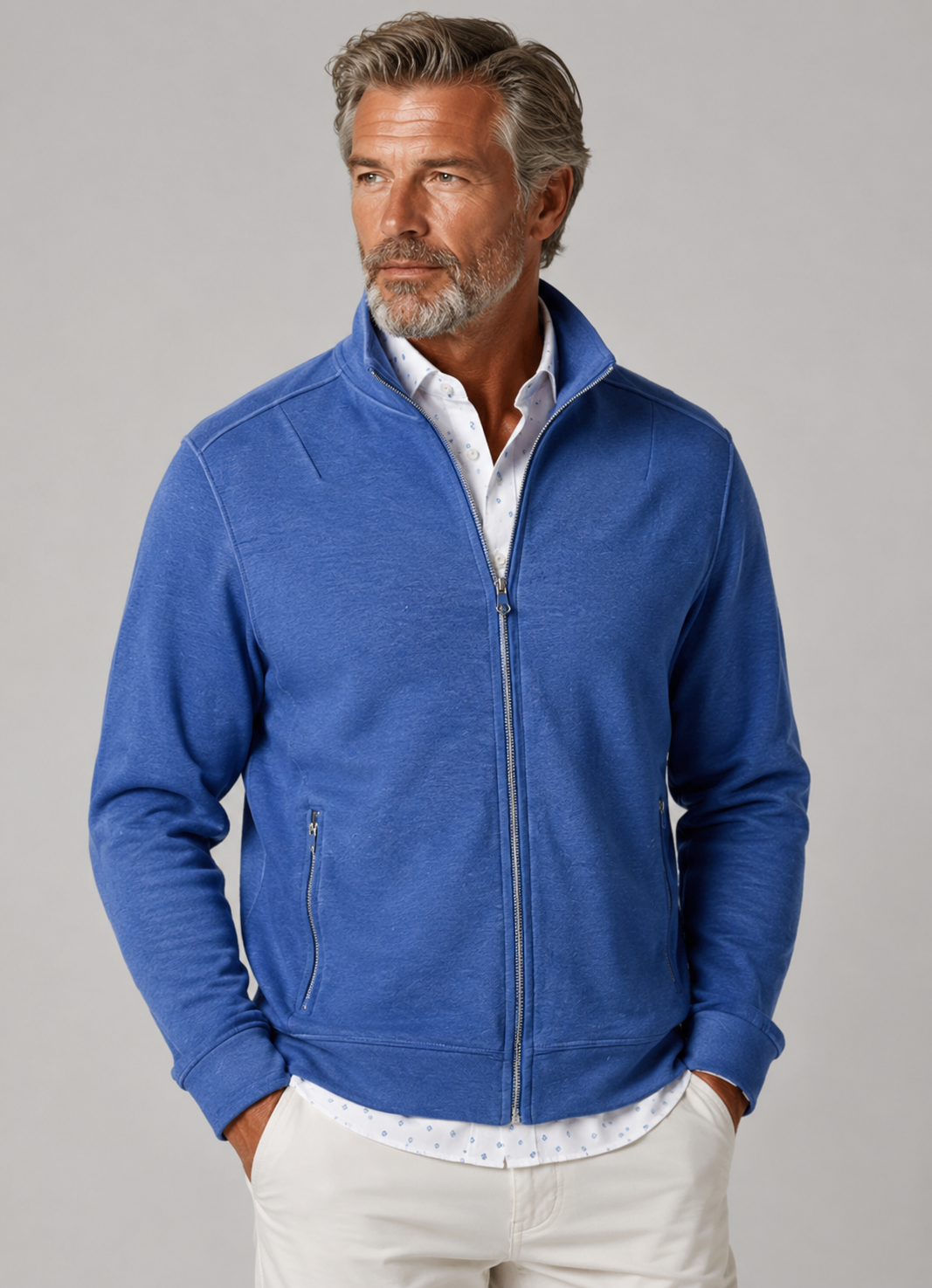 Man wearing a Tokyo Blue Buki Sweatshirt over a Buki shirt on a gray background