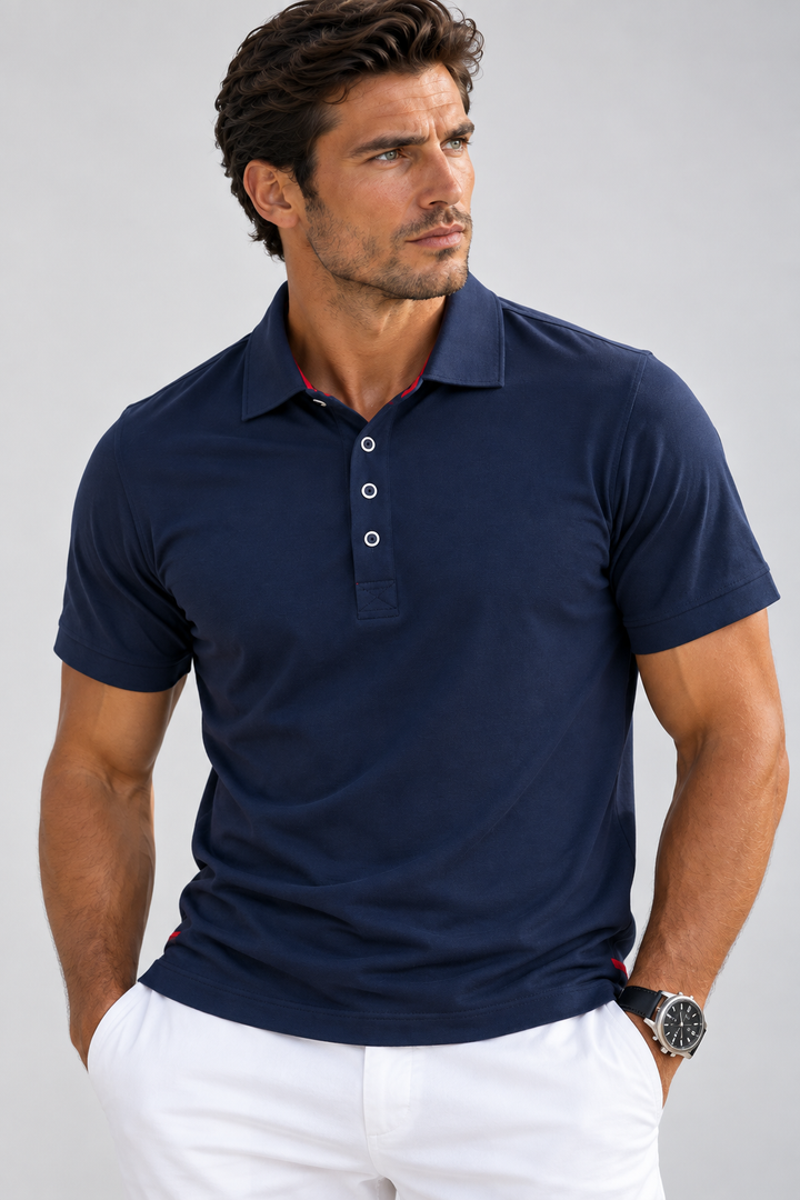 Man wearing Buki Cinqo Polo in Navy in studio L