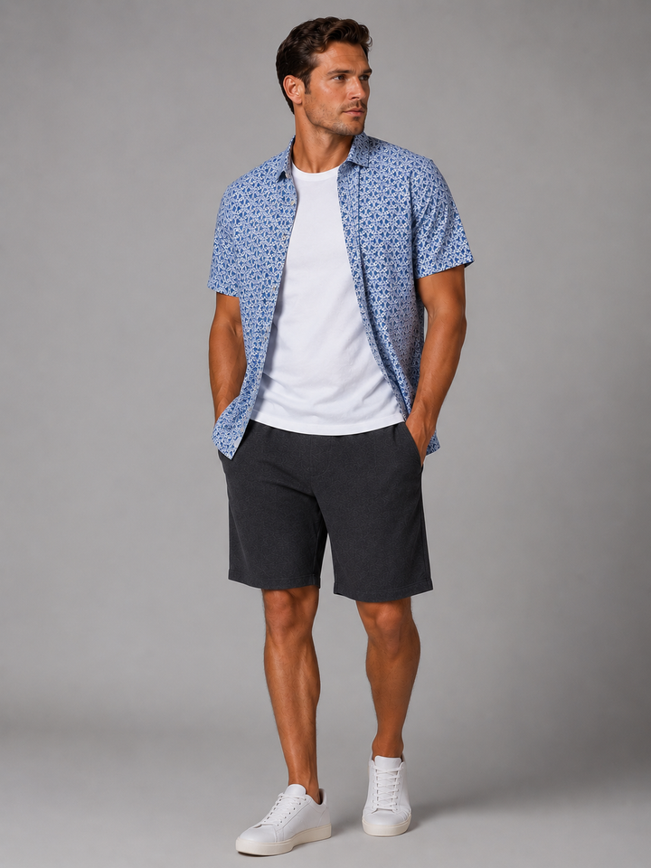 Field Day Tech Shirt worn open  over a scrimmage short with a Cinqo White Tech Tee