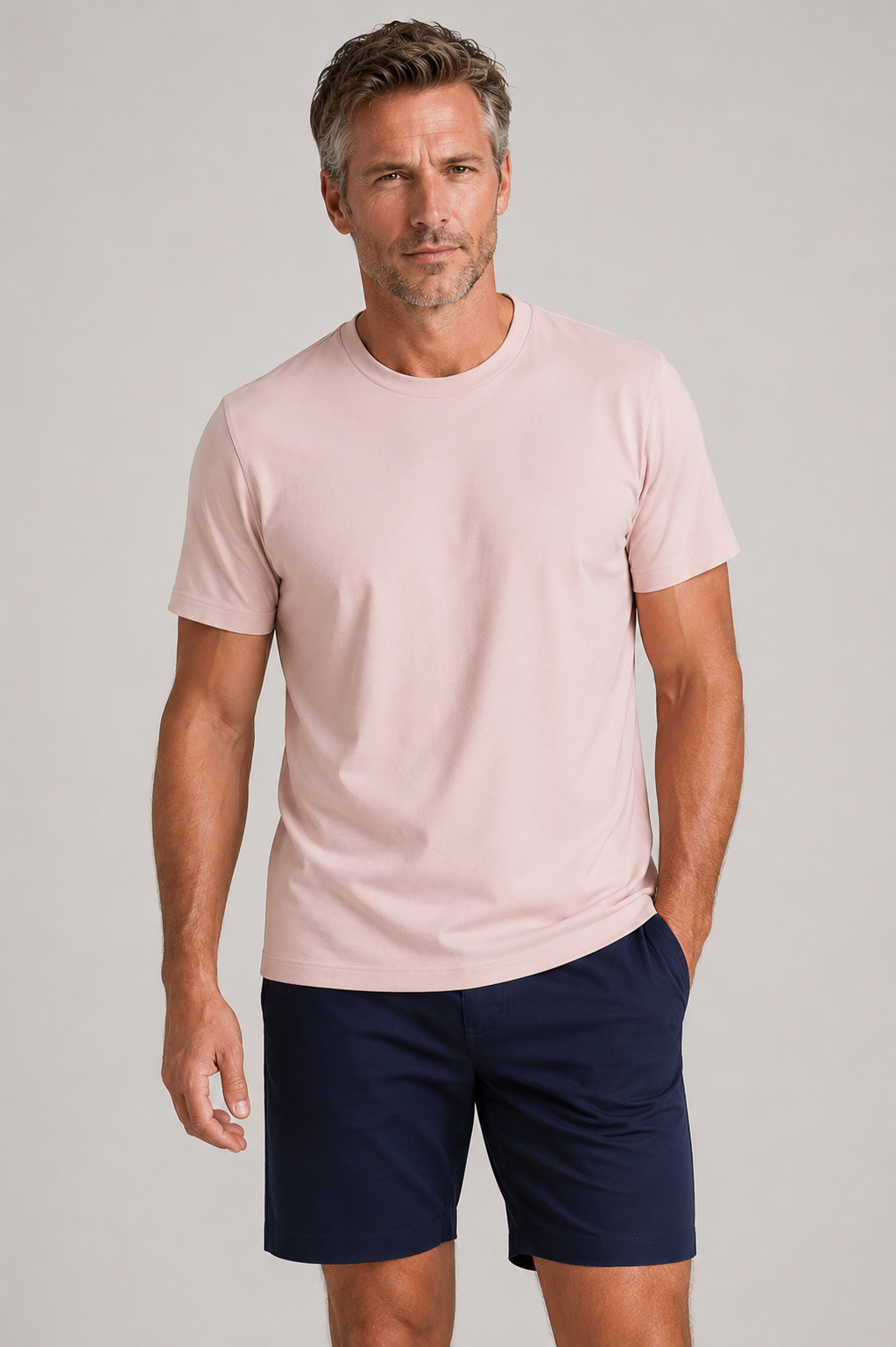 Rose Buki Cinqo T-shirt and navy High Five  shorts on a gray background