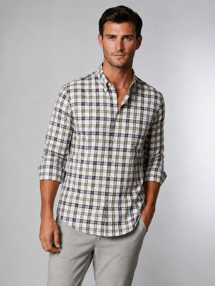 Man wearing Buki Latitude Long sleeve Tech Shirt L with a heather grey pant in a studio shoot. 