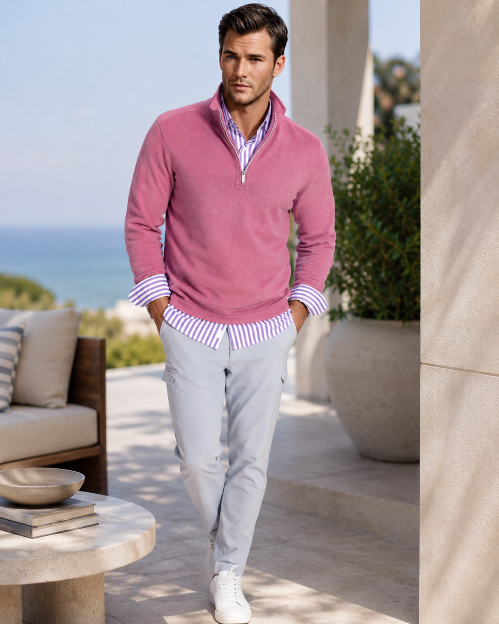 Man wearing a Voey Quarter Zip with Go Big Stripe in Grape shirt and Heather gray pants, standing outdoors.