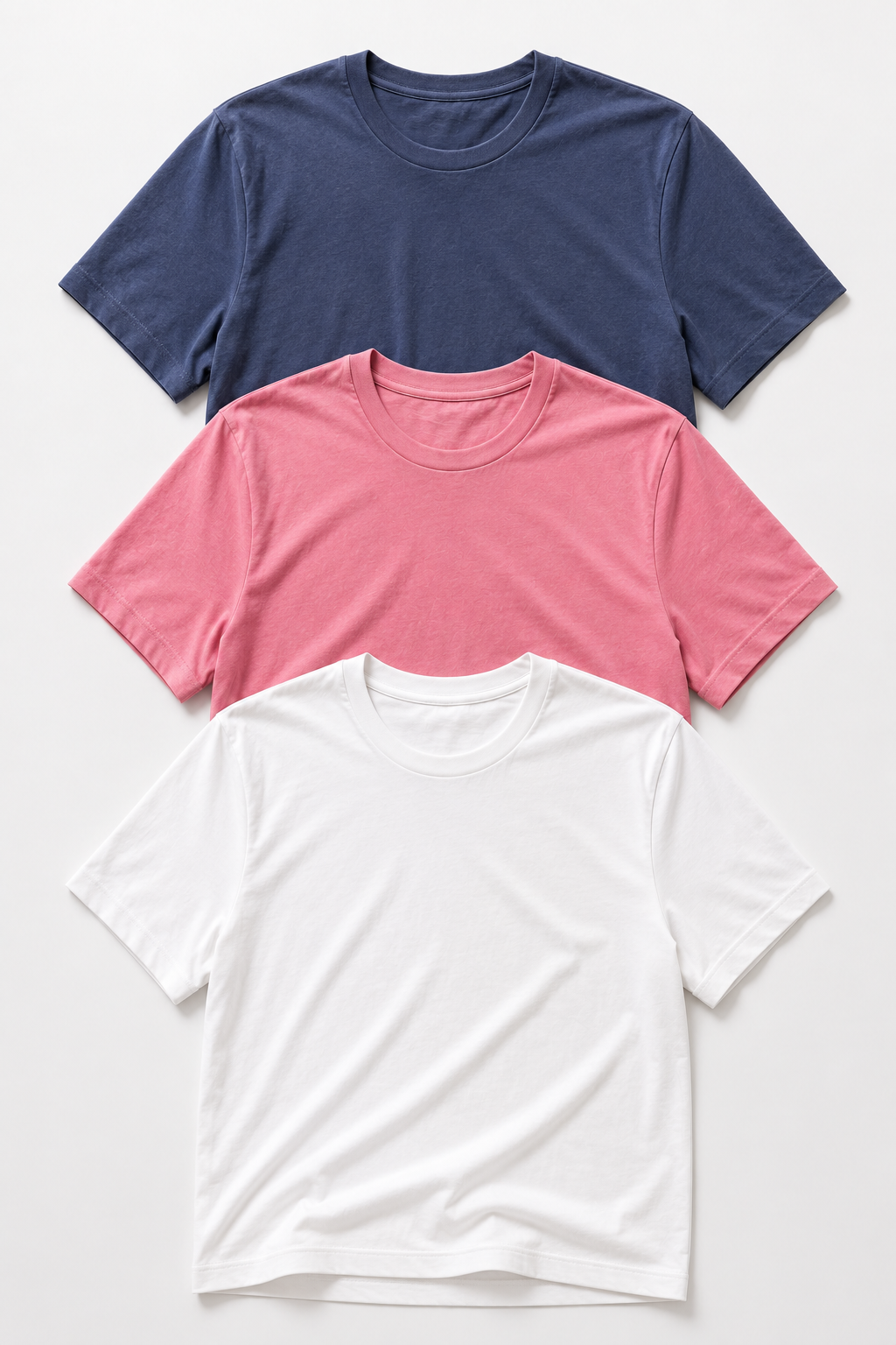 Buki Cinqo T-shirts in Slate Rose, Blue and White in a flat lay