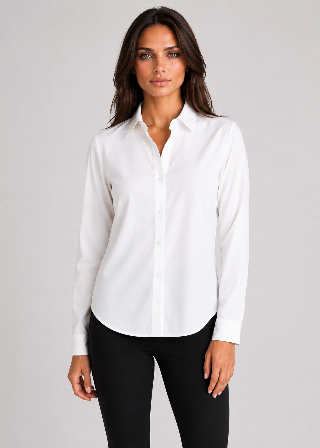 Woman wearing washable stretch Blouse in Whitewith Black Straight SJkinny Legging  on a gray background