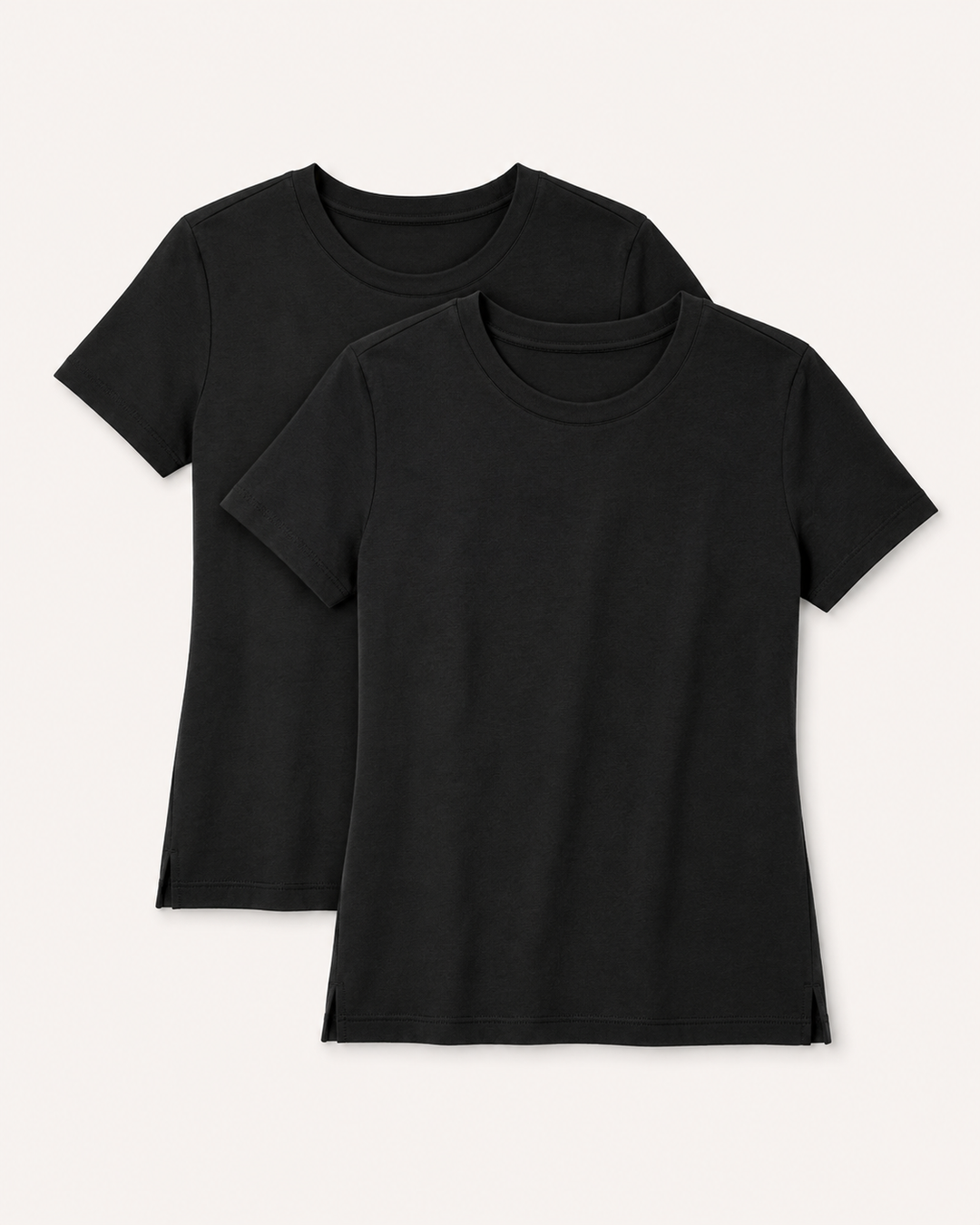 Two Buki Cinqo black short-sleeve crewneck T-shirts shown overlapping on a light warm gray background.